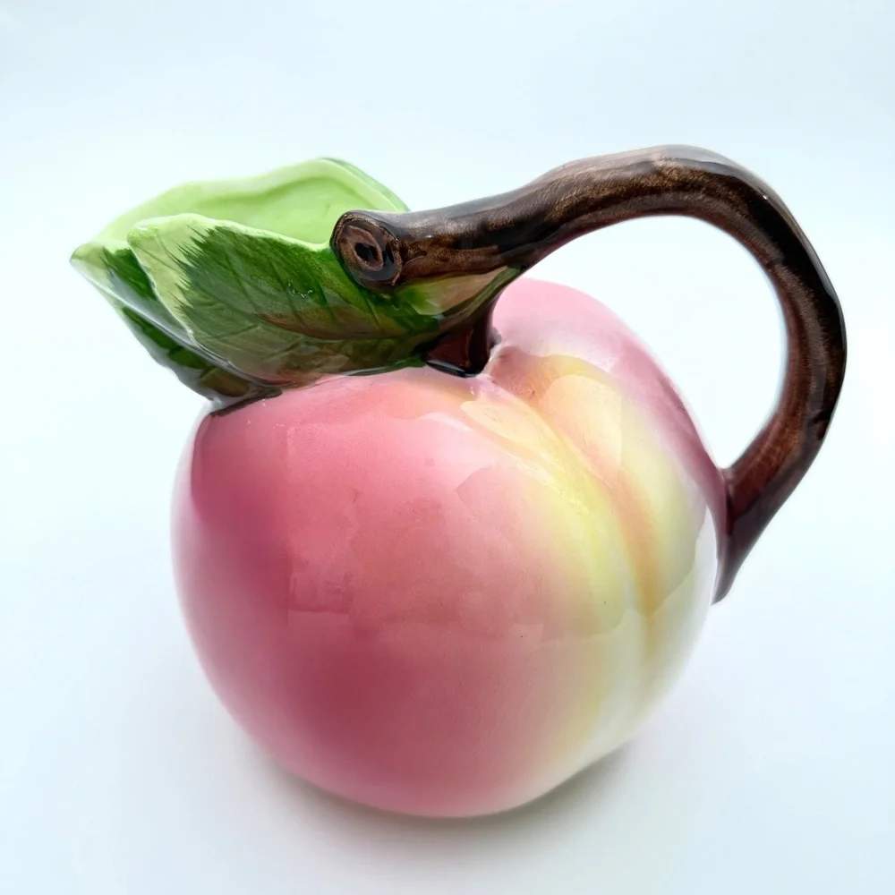 Pottery Barn Porcelain Peach Glaze Shaped Pitcher from the 1990s